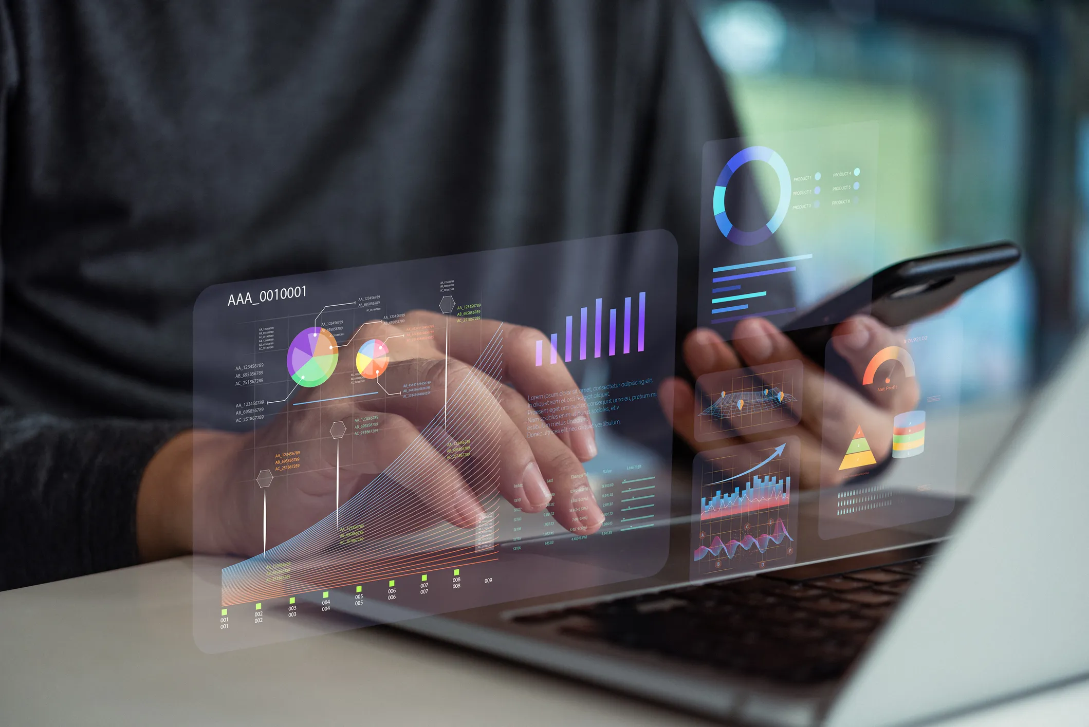 SaaS dashboard design on screen in a modern workspace